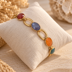 Gouden stainless steel armband met gekleurde stenen op sieradenkussentje – Ibiza stijl dames armband EllesDelanaStyle