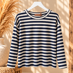 MOOI Striped Sparkle Top met navy en crème strepen en lange mouwen op een kledinghanger