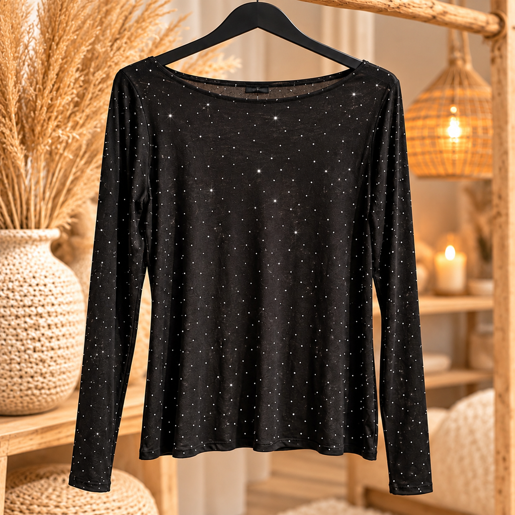 Zwarte Top Strass Vera Jo met subtiele glitters op een kledinghanger   