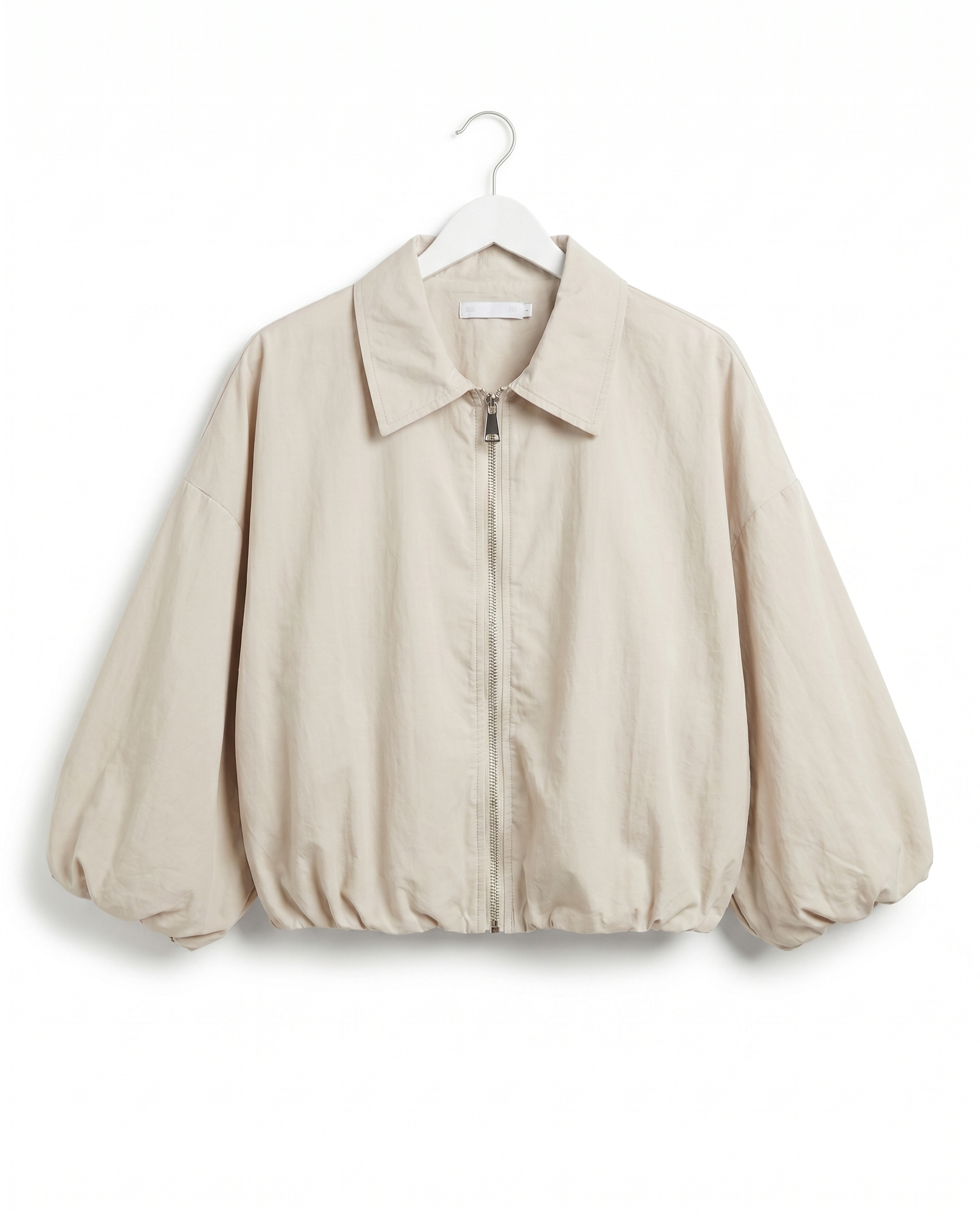 Faye Zomerjasje – Beige Jasje met Rits en Ballonmouwen